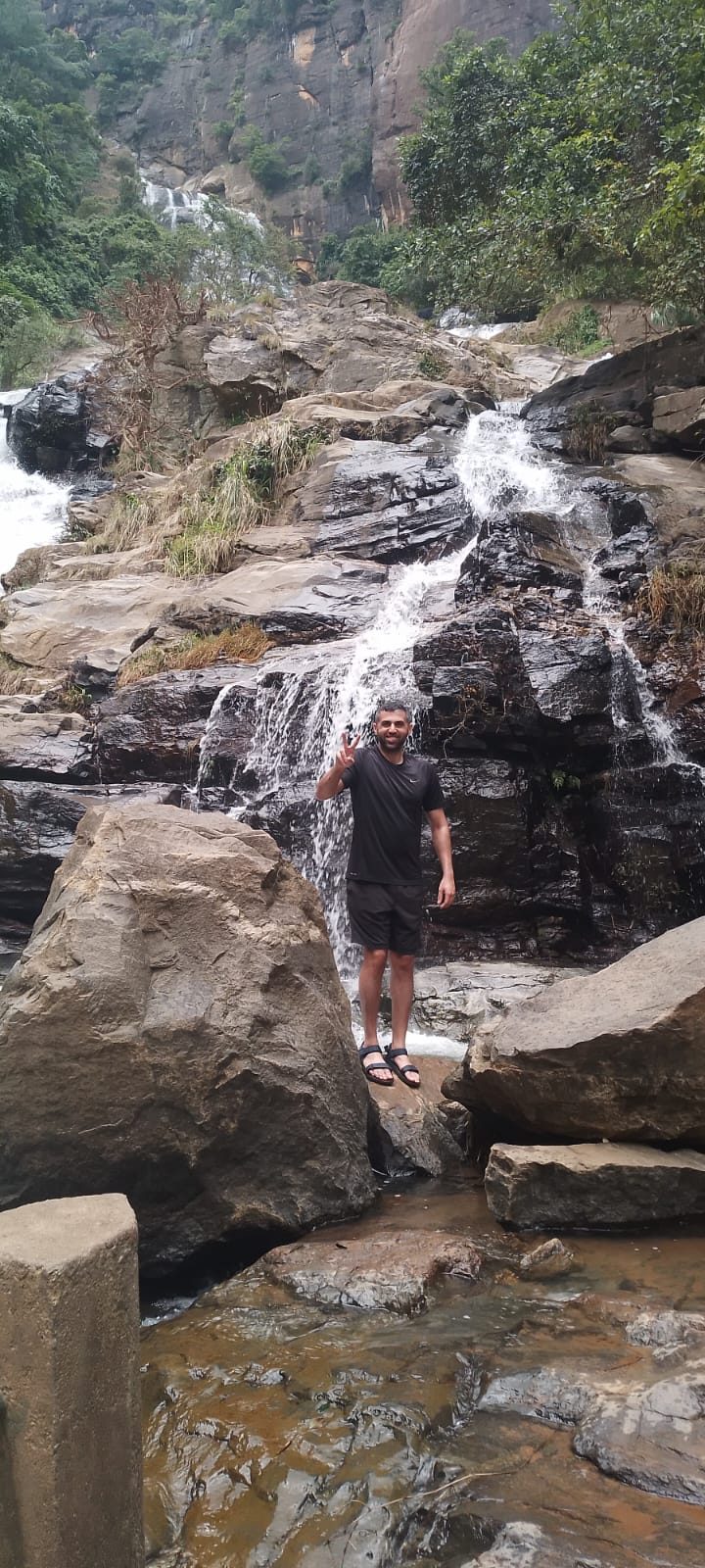 Traveller in front of Ravana Falls